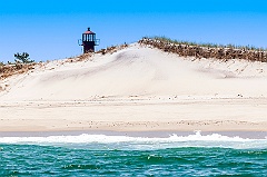 Monomoy Lighthouse Tower Behind Beach Dunes on Cape Cod